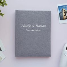 a gray book with the words natalie and brandon on it