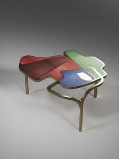 two tables with different colored shapes on them