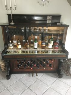 an old fashioned bar with liquor bottles on it