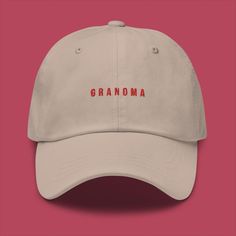 This is our Embroidered Grandma Hat. A hat that has a minimalistic Scandinavian design with an embroidered print that will show the world what you are in a subtle but classy way.  The hat has an unstructured form, a curved visor, and an adjustable buckle strap. Made out of 100% chino cotton twill, it will not only be classy but also very comfortable to wear. * 100% chino cotton twill * Unstructured, 6-panel, low-profile * 6 embroidered eyelets * 3 ⅛" (7.6 cm) crown * Adjustable strap with antiqu Grandma Hat, Be Classy, Gift For Grandma, Adjustable Hat, Grandma Gifts, Scandinavian Style, Trucker Cap, Scandinavian Design, Cotton Twill