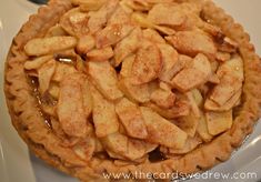 an apple pie is sitting on a plate