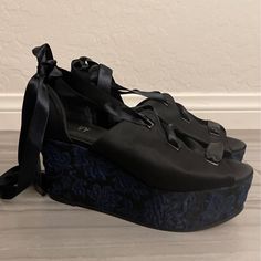 Size 37. In Great Condition. Never Worn. Black Satin On Top With Blue Suede Design On The Platform. Black Fallen Angel, Goth Shoes, Ask Yourself, Fallen Angel, Blue Suede, S B, The Platform, Black Satin, Lace Up