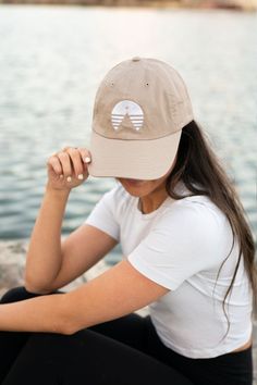 khaki dad cap with white logo