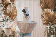 a wedding cake sitting on top of a table