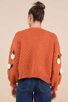 We know that the Lulus Chosen Charm Rust Orange Knit Embroidered Cardigan Sweater will always be your first pick when it comes to showing off your style! Cozy, heavy-gauge knit shapes this eye-catching cardigan sweater that features three-dimensional, crocheted floral embroidery throughout. Long balloon sleeves (with drop shoulders and fitted cuffs) frame a wide-cut, open-front bodice. Ribbed knit accents the neckline, cuffs, and hem. Fit: This garment fits true to size. Length: Size medium meas Orange Knit, Orange Cardigan, Embroidered Cardigan, Long Balloons, Embroidered Sweater, Rust Orange, Balloon Sleeves, Floral Embroidery, Cardigan Sweater