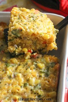 a casserole dish with broccoli, corn and cheese in it is ready to be eaten