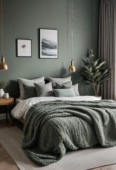 a bedroom with green walls and white bedding