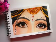 a drawing of a woman's face with large brown eyes and bright orange accessories