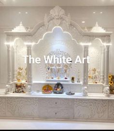 the white art is displayed in an ornate room