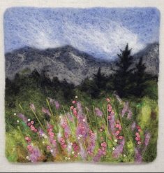 a painting of flowers and mountains in the background