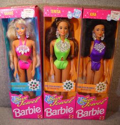 two barbie dolls are in the same package