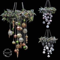 two christmas ornaments hanging from chains and decorated with greenery, pine cones and baubles