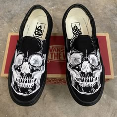 Show off your love of all things spooky in these skull head vans. The eerie theme of these slip ons have a sketched white skull, adding character and mystery to the look.We buy each pair of shoes BRAND NEW. Each pair is made to order, please make sure you put in the correct shoe size before you check out. The paint is permanent and will never come off, fade away, or peel off. Made in the USA. This price includes everything: shoes, artwork, and shipping. Thanks for stopping by our Etsy shop! Plea Custom Slip On Vans, Bling Aesthetic, Shoes Artwork, Van Shoes, Custom Vans Shoes, Vans Slip On Shoes, Clothes Art, Slip On Vans, Custom Shoes Diy