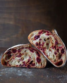 two pieces of bread that have been cut in half and are sitting on a table