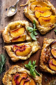 peach tarts with herbs on a wooden table