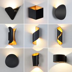 several different types of modern wall lights on the side of a white wall with black and gold accents