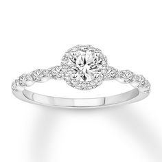 a white gold engagement ring with diamonds