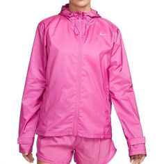 Nike Essential Women's Running Jacket Size M Pink Cu3217 684 The Nike Essential Running Jacket Helps You Keep Running When Wet Weather Arrives. Water-Repellent Fabric Combines With Hooded Coverage To Help You Stay Dry For Miles. Benefits Woven Fabric Is Water-Repellent To Help Keep You Dry. A Back Pocket Delivers Storage For Your Gloves, Hat Or Fuel. Front Zippered Pockets Double As Hand Warmers And Small-Item Storage. A Hook-And-Loop Cuff Lets You Adjust The Fit. Hood Helps Keep You Covered Fro Pink Sports Windbreaker, Pink Windbreaker For Sports, Pink Track Jacket For Outdoor, Pink Hooded Nike Windbreaker, Pink Nike Windbreaker For Winter, Nike Pink Windbreaker For Winter, Nike Running Jacket, Womens Running Jacket, Nike Crew Neck