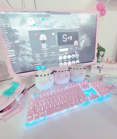 a desktop computer sitting on top of a desk next to a keyboard and mouse pad