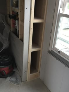 a room that is being built with some shelves