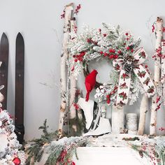 a christmas display with wreaths and decorations