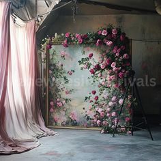 an image of pink roses on a floral wall hanging in front of a curtained backdrop