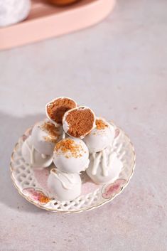 small desserts on a plate with powdered sugar