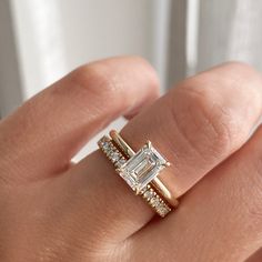 Simple Engagement Ring Rectangle, Double Banded Emerald Cut Ring, Luxury Minimalist Square Cut Ring, Gold Rectangle Engagement Ring With Extra Band, Gold Square Engagement Ring Three, Emerald Cut Diamond Rings With Gold Band, Emerald Cut Engagement Ring Real, Luxury Minimalist Wedding And Engagement Styles, Luxury Minimalist Wedding And Engagement