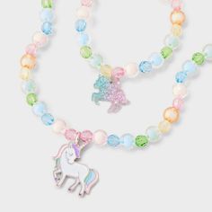 Style your little one with the Toddler Rainbow Unicorn Necklace & Bracelet from Cat & Jack™. This delightful 2-piece set includes a pull-on necklace and a snap-on bracelet, both featuring adorable unicorn charms in vibrant rainbow colors. Made from zinc alloy, acrylic and iron, this set is designed for toddlers to bring all the vibes to their outfits in an instant. Cat & Jack™: Designed for all children so you can trust it's made for yours. Glowing Necklace, Unicorn Charm, Charm Choker Necklace, Unicorn Necklace, Bff Necklaces, Choker Necklace Set, Boys Accessories, Rainbow Unicorn, Colourful Necklace