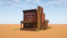 a small brick building sitting in the middle of a desert