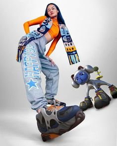 a woman standing on top of a skateboard next to two cartoon characters in front of a white background