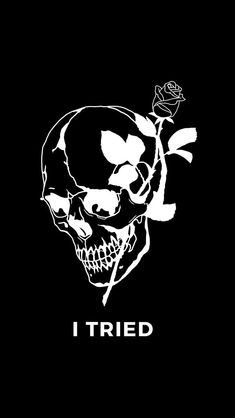 a skull with a rose in its mouth and the words i tried written on it