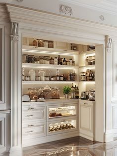 a kitchen with marble flooring and white cupboards filled with food, drinks and condiments