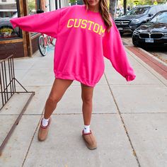 Customize your sweatshirt with the city, state, (or whatever you want!) with a yellow design on a cozy bright pink sweatshirt! We love the preppy aesthetic and of course, the pink! Sizing of the wording will vary based on the length of the word chosen. If you have questions about your custom design idea, reach out to us! ♥ Our unisex heavy blend crewneck sweatshirt is pure comfort. These garments are made from polyester and cotton. This combination helps designs come out looking fresh and beauti Pink Crew Neck Sweats For Spring, Pink Casual Sweats For Fall, Pink Cotton Sweatshirt For College, Pink Crew Neck Sweater With Ribbed Cuffs, Casual Pink Sweats For Fall, Pink Slogan Hoodie With Crew Neck, Pink Crew Neck Sweatshirt For College, Trendy Pink Sweater With Letter Print, Casual Pink Crew Sweatshirt