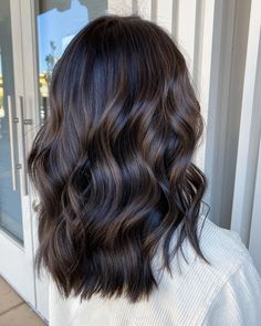 Elevate your style with 26 dark hair color ideas for winter 2025, showcasing rich tones like deep black, chocolate brown, and balayage. Whether you're sporting short, curly hair or long, straight locks, these hair color trends offer endless inspiration. Perfect for brunettes, Asian hair types, and blondes looking for a bold transformation, these dark hues, including deep purple and red accents, will keep your look fresh and modern. Hair Balayage Ideas, Black Hair With Brown Highlights, Dark Hair Color Ideas, Shoulder Length Black Hair, Dark Hair Color, Medium Brunette Hair, Hair Color Ideas For Winter