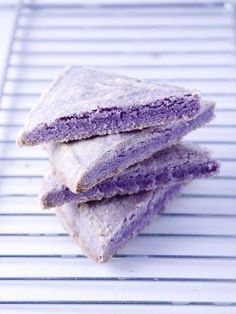 three purple shortbreads stacked on top of each other