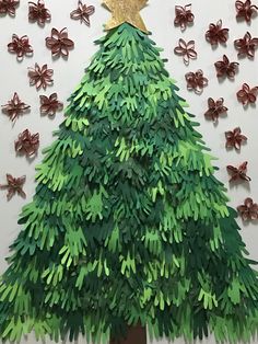 a christmas tree made out of green paper