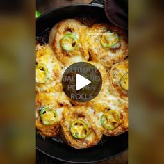 a pan filled with food on top of a wooden table