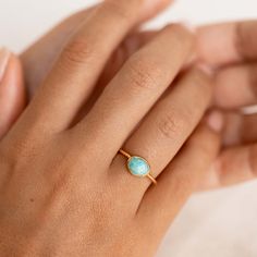 Gemstone ring featuring a stunning amazonite crystal set in gold vermeil. Add a pop of color to your stacks with this vibrant statement ring! 

Amazonite is believed to be a calming stone that promotes balance, harmony and positive energy flow. 

These beautiful gemstones are all natural stones and may have tiny inclusions; it's part of their natural beauty!

Amazonite gemstone measures at 9mm x 7mm.
 Size: 5, 6, 7, 8, 9 Amazonite Crystal, Amazonite Ring, Calming Stones, Detailed Ring, Energy Flow, Crystal Set, Sustainable Jewelry, Recycled Gold, Dream Jewelry