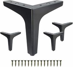 three black metal brackets with screws on them