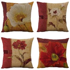 four decorative pillows with flowers on them