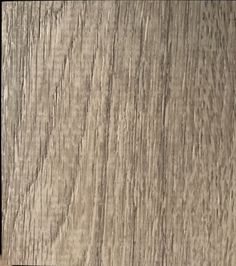 a close up view of the wood grains on this wooden paneled flooring