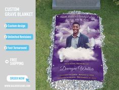 a memorial blanket with the image of a smiling man on it in front of a grave