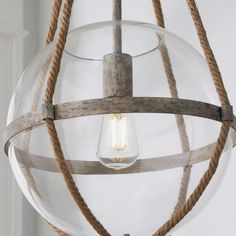 a light fixture with rope wrapped around it