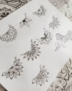 some drawings are laying on top of each other in black and white ink, which is also part of a coloring book