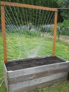 a raised garden bed with sprinkles in it