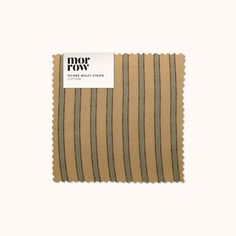 a piece of fabric with stripes on the front and back of it, in beige