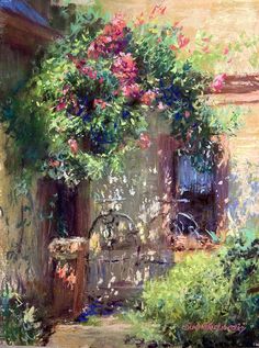 an oil painting of flowers hanging over a doorway