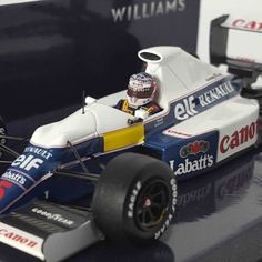 a toy race car sitting on top of a table