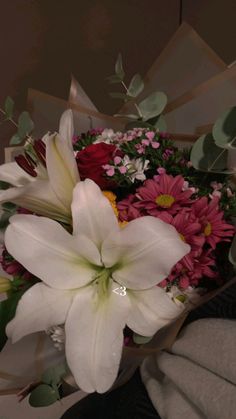 a bouquet of flowers sitting on top of a table